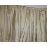 CURTAINS, a pair, in cream stripe, lined and interlined, each curtain 185cm W gathered x 248cm drop.