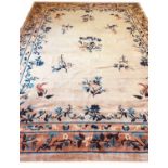 PEKING ART DECO CARPET, 360cm x 257cm, of blue floral sprays and birds, on coral field.