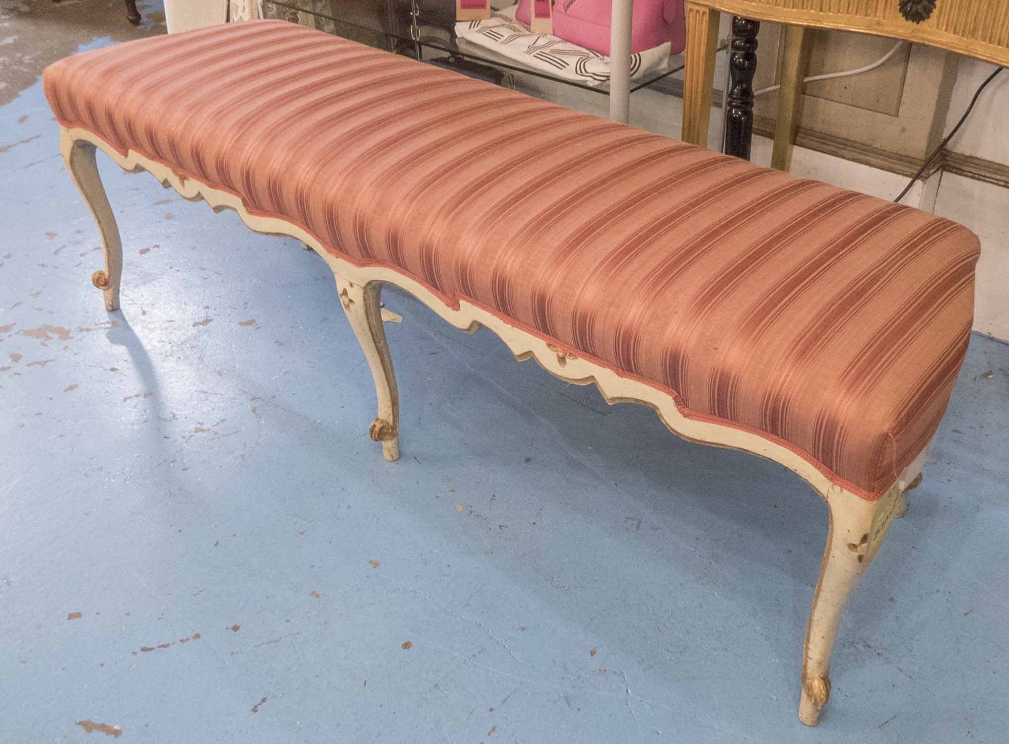 LONG STOOL, 18th century Continental cream painted with red striped upholstery on cabriole supports,