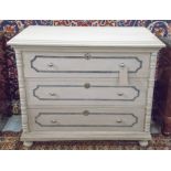 COMMODE, 19th century French traditionally grey painted with three long drawers and turned supports,