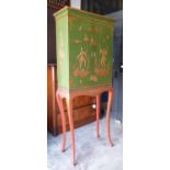 CABINET ON STAND, Chinese export design, green painted, Chinoiserie decoration and parcel gilt,