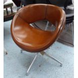 REVOLVING ARMCHAIRS BY BOSS, a pair, mid brown leather, revolving on chromed supports.