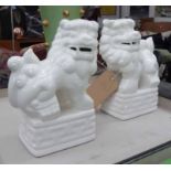 FU DOGS, a pair, Chinese style blanc de chine, 30cm H.