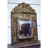 WALL MIRROR, 19th century Dutch, repoussé gilt metal and faux tortoiseshell panelled,