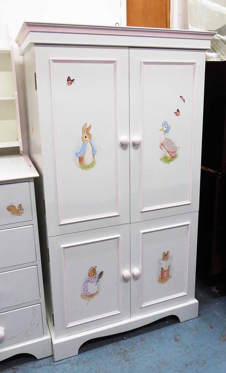 DRAGON'S OF WALTON ST. WARDROBE, with four doors and interior shelves, 82cm x 53cm x 146cm H.