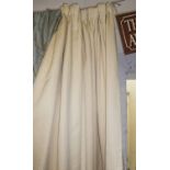 CURTAINS, a pair, gold patterned fabric, lined, each curtain 112cm W gathered x 227cm drop.