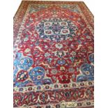 ANTIQUE PERSIAN TABRIZ SAFAVID CARPET, 437cm x 280cm, of sapphire medallion, on ruby field, signed.