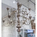 CHANDELIER, of large proportions, two tier, scrolled metal and silver giltwood, 120cm H x 103cm W.