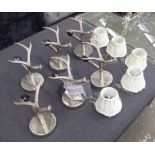 WALL SCONCES, a set of six, faux antler, 27cm L with five shades.