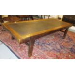 CHINESE DAYBED / LOW TABLE, elm with a rectangular rattan centred top, 212cm L x 53cm H x 87cm D.
