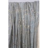 CURTAINS, a pair, blue and gold, lined, each curtain 85cm W gathered x 243cm drop.