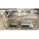 LOW OCCASIONAL TABLES, a pair, gilt metal framed, three tier, each with a square mirrored top,