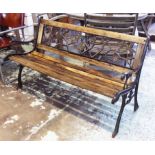 GARDEN BENCH, metal framed and wooden with leaf and floral decoration, 127cm L x 74cm H x 55cm D.