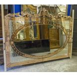 WALL MIRROR, Venetian design, peach glass bordered with ornate crest,