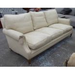 SOFA, traditional style in an oatmeal fabric on square tapering supports on castors, 81cm x 210cm L.