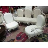 CONSERVATORY SOFA, three seater, in a cream fabric on a metal frame,