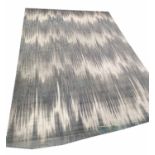 CALVIN KLEIN RUG, all over abstract design on abashed grey ground, 419cm x 297cm.