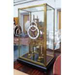 SKELETON CLOCK, contemporary in brass and glass case with ebonised base, 54cm x 24cm x 33cm.