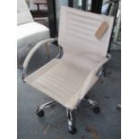 OFFICE CHAIR, in cream leather on chromed metal swivel base, 57cm W.