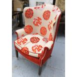 WILLIAM YEOWARD BARREL BACK CHAIR, in patterned upholstery on square supports and castors,