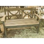 GARDEN BENCH, weathered teak with lattice back, 127cm W.