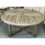 GARDEN TABLE, weathered teak, by Gloster, with circular top and extra leaf,