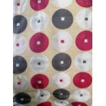 CURTAINS, a pair, in a geometric circled fabric lined, 174cm x 228cm drop.