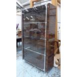 GLAZED BOOKCASE, with three glass shelves, in macassar finish with lucite supports,