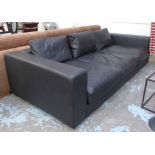 SOFA, three seater, in tanned leather, on block supports, 278cm L, original cost £5000.