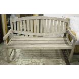 GARDEN BENCH, weathered teak with oval slatted back, 150cm W.