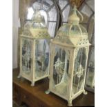 GARDEN LANTERNS, a pair, distressed metal framed, each with a handle to the top and glazed panels,