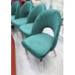 GREEN DINING CHAIRS, a set of six in bottle green velvet fabric, on turned supports, 49cm W.