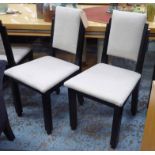 DINING CHAIRS, a set of ten, Art Deco style in cream fabric on ebonised supports, 47cm W.