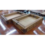 DRINKS TRAYS, a set of six, stamped with various Champagne houses, 56cm widest.