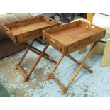 TRAY TABLES, a pair, stamped with various Champagne houses, 78cm.