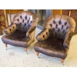 TUB ARMCHAIRS, a pair in brown velvet with buttoned backs on turned supports and castors, 70cm W.