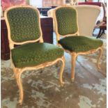 SALON CHAIRS, a pair, Louis XV style, grey painted and parcel gilt with green cut velvet upholstery,