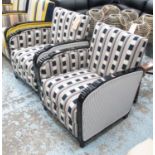 ARMCHAIRS, a pair, Art Deco style, in a geometric fabric on an ebonised frame, 64cm W.