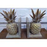 BOOKENDS, a pair, distressed gilt composite pineapple form, 26cm H.