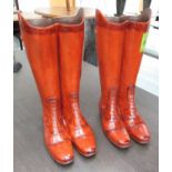RIDING/WALKING STICK STANDS, two pairs, country estate boots design, stylised finish, 48cm H x 25cm.