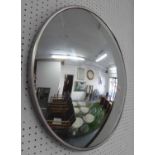 BUTLERS MIRROR, in a steel rimmed frame, 61cm diam.