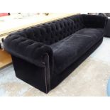 CHESTERFIELD STYLE SOFA, contemporary, black velvet finish, 250cm W.