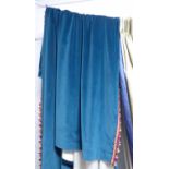 CURTAINS, a pair, in blue fabric lined with tassles, gathered each 170cm W x 252cm drop.