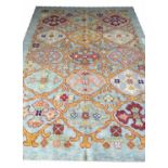 FINE OUSHAK RUG, 243cm x 177cm, of polychrome design of cruciform medallions on aqua marine field.