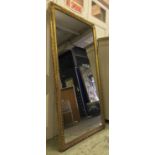WALL MIRROR, 19th century giltwood and gilt gesso moulded with indented top and egg and dart frame,