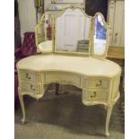 DRESSING TABLE, cream and gilt highlighted, with triple mirror above five drawers,