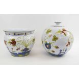 AN ITALIAN FAIENCE JARDINIERE, and a matching large globular vase.