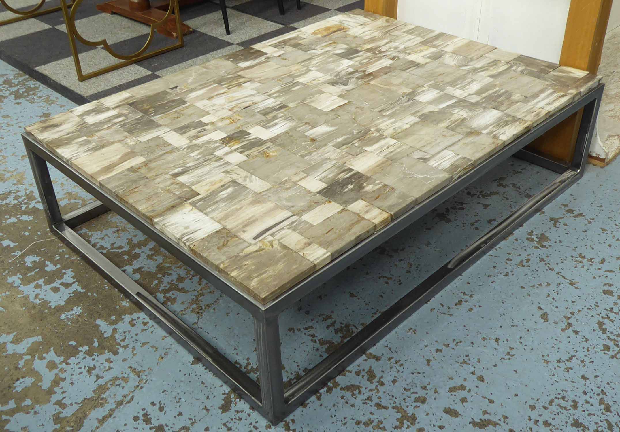 LOW TABLE, the mosaic top in petrified wood sections on a metal base,