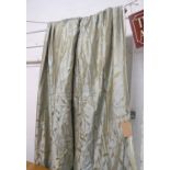 CURTAINS, a pair, in silk floral details on a blue ground, lined and interlined,