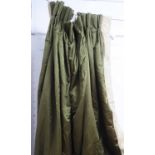 CURTAINS, a pair, in a silken green patterned fabric, lined and interlined with a contrasting edge,